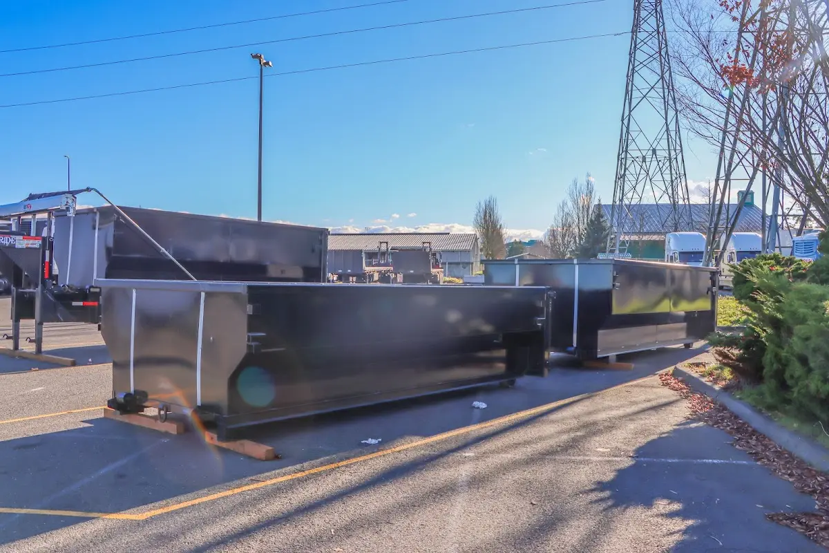 Roll-off dumpster ready for waste disposal at job site for 2 Yard Dumpster Rental in Clay